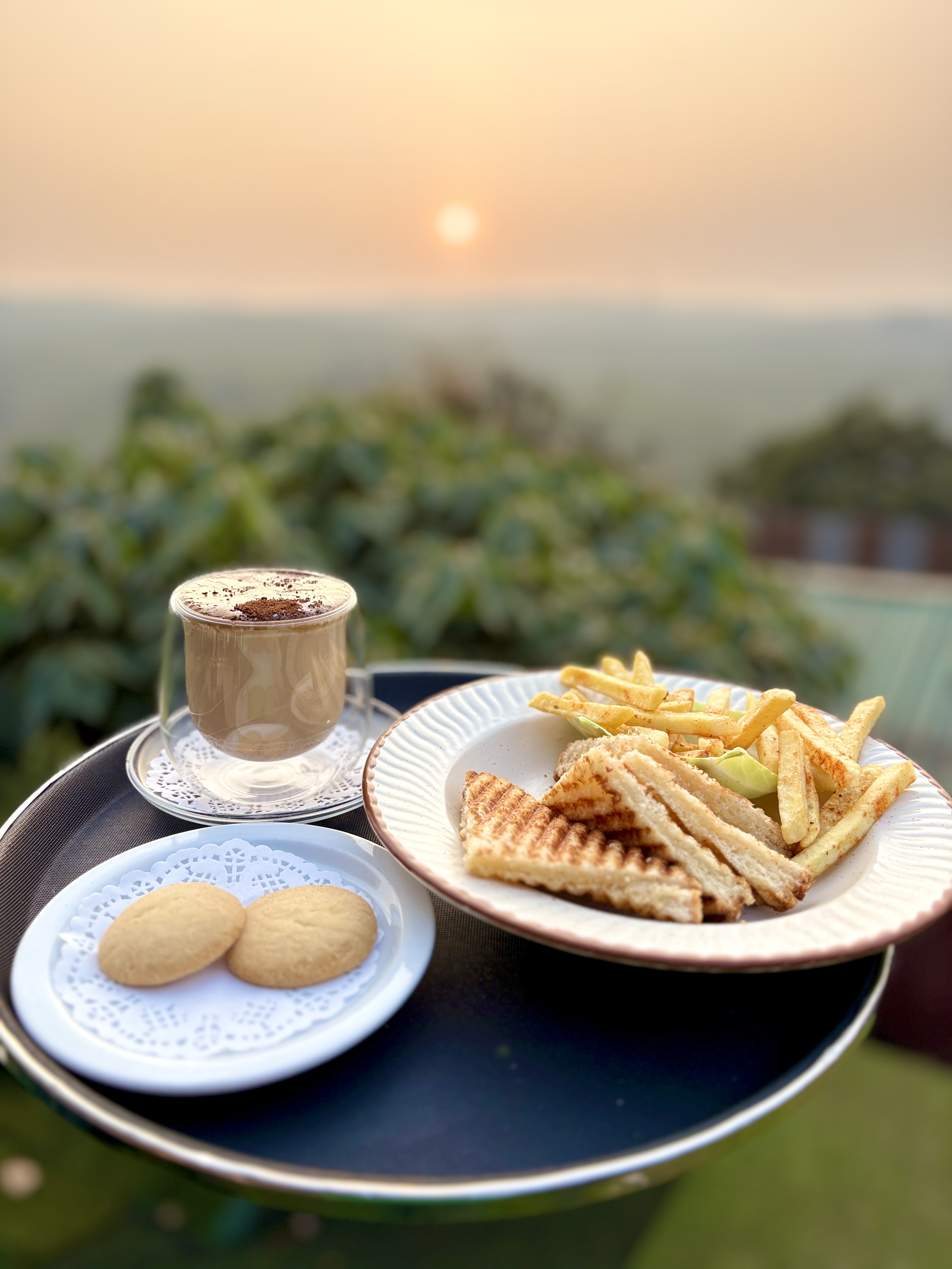 Evening coffee and sandwich at sunset